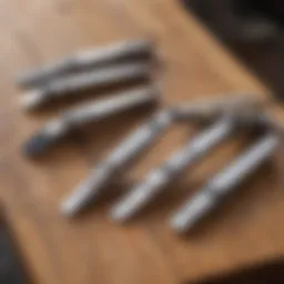 A variety of cat nail clippers displayed on a wooden surface