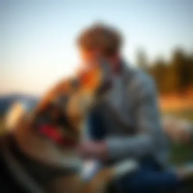 Positive Interaction between Owner and Dog An owner interacting positively with their dog